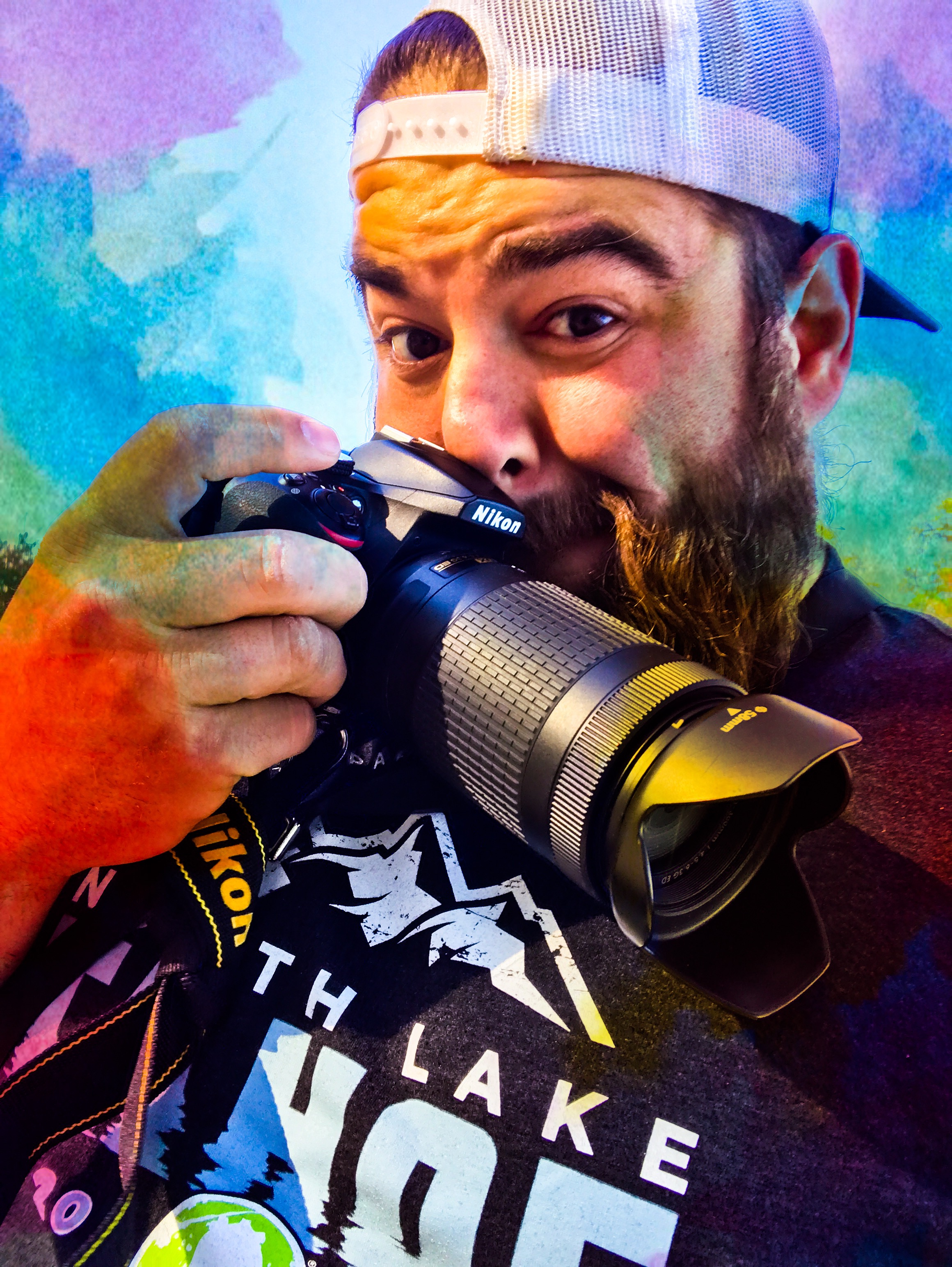 Bear Eberly holding a camera